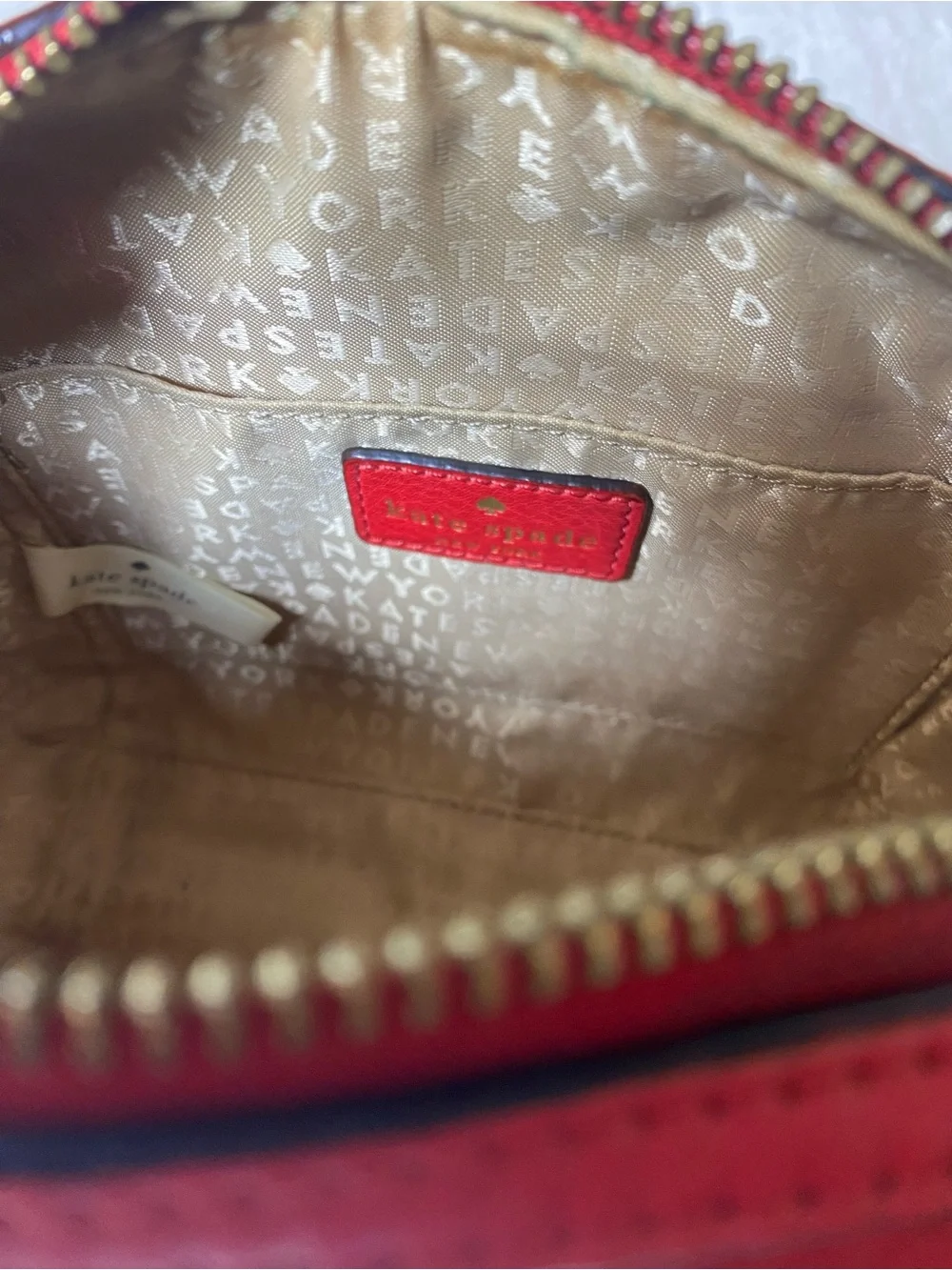 kate spade Perri Lane Bubbles Looloo red laser-cut crossbody